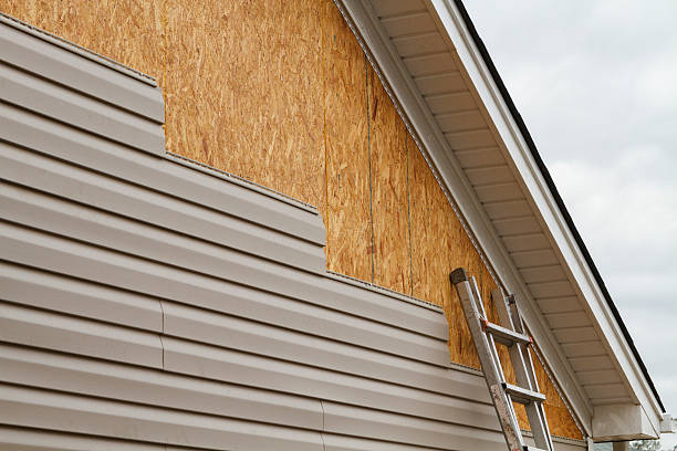 Professional Emergency Siding Repair technician working in Siloam, NC
